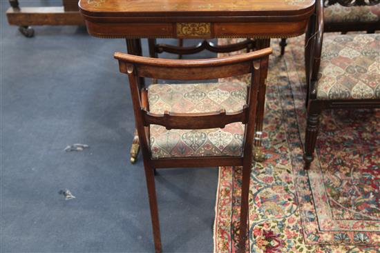 A harlequin set of twelve (6 + 6) William IV mahogany dining chairs,